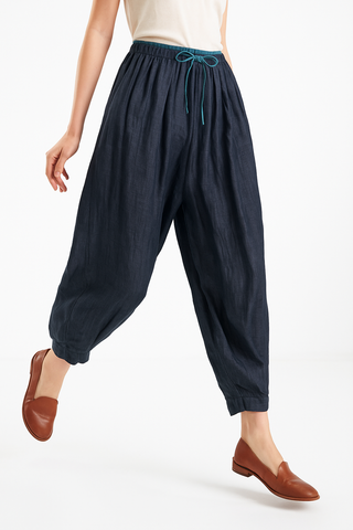 Relaxed high-rise tapered trousers for women | Solenne
