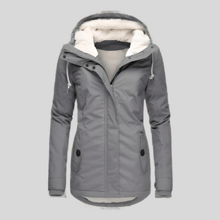 Waterproof hooded jacket with long silhouette for women | Madelyn
