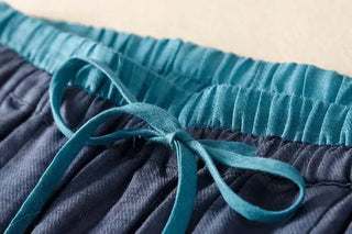 Relaxed high-rise tapered trousers for women | Solenne