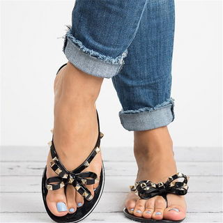Gold Studded Bow Jelly Thong Sandal | Stella